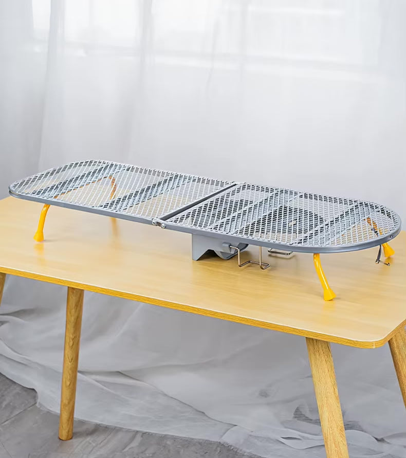 Petite table à repasser compacte et pliable